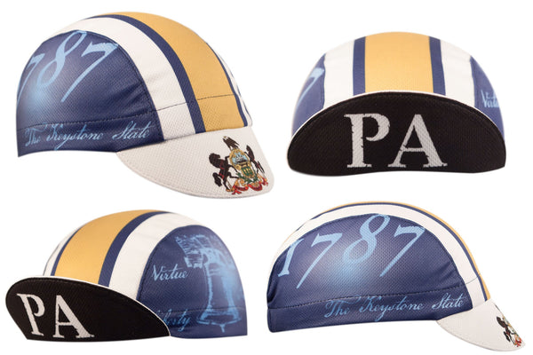 Pennsylvania Technical 3-Panel Cycling Cap.  Blue, white, and yellow cap with 1787 and The Keystone State text on side.  Pennsylvania coat of arms on bill.  4 different views.